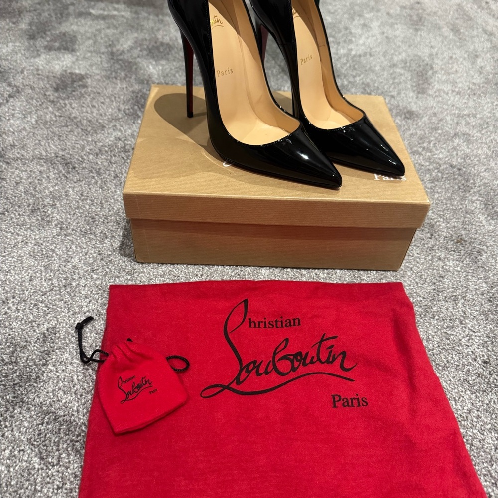 Brand new in box Christian Louboutin Black Patent Heels with Red Sole